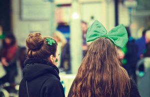 two women wearing St. Patrick's Day attire