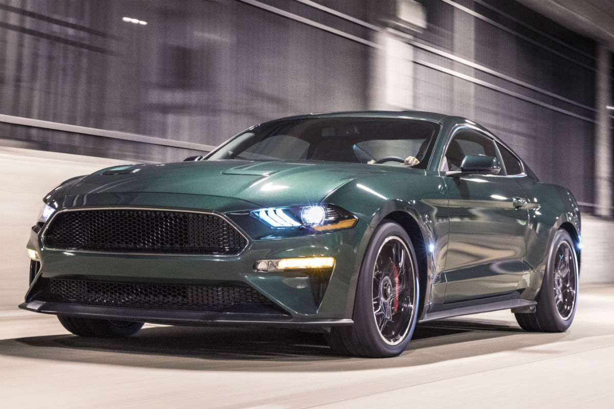 front view of a Dark Highland Green exterior colored 2019 Ford Mustang Bullitt