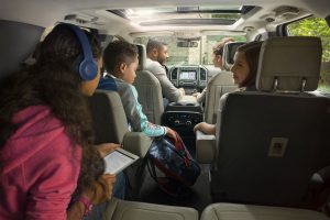 full interior of a 2018 Ford Expedition with a family enjoying its features