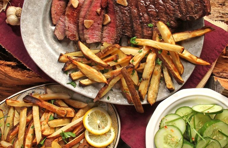 plated steak and fries dish