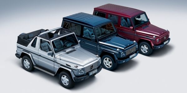 Three 1997 Mercedes-Benz G-Class Models on White Background