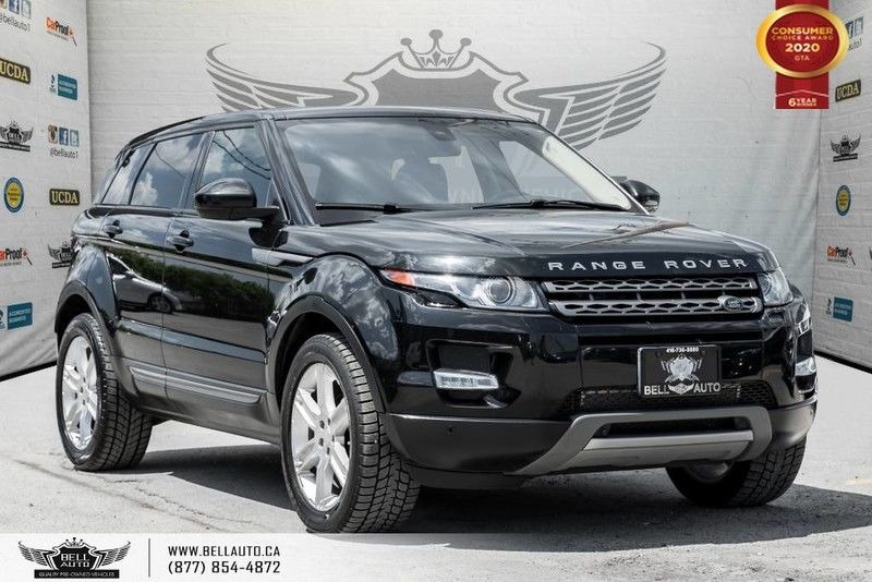 Exterior view of a black 2015 Land Rover Range Rover Evoque in the Bell Auto Inc showroom