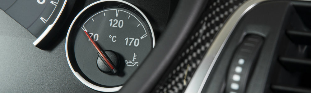 Closeup image of temperature gauge inside vehicle