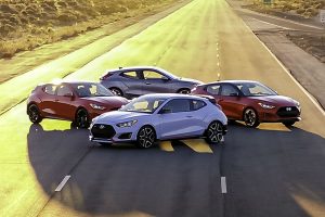 four-2019-Hyundai-Veloster-models-clumped-together-on-a-track