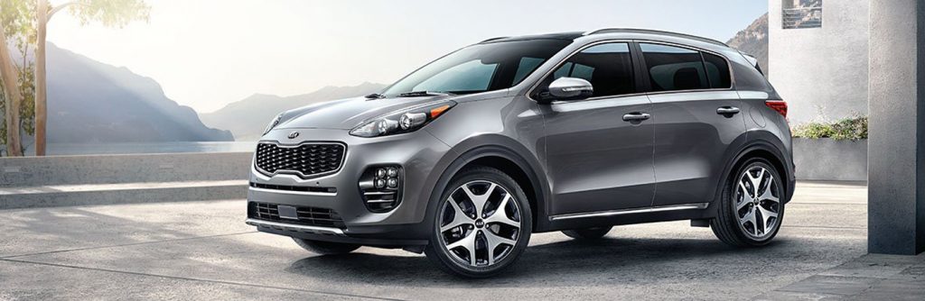 Profile view of 2018 Kia Sportage parked in building