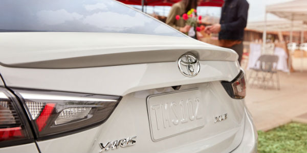 Close Up of White 2019 Toyota Yaris Sedan XLE Rear Exterior