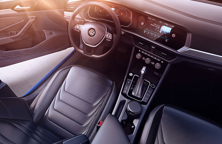 Raised view of the interior of a 2019 Volkswagen Jetta, with the infotainment system plopped in the center.