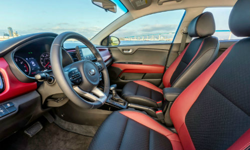 2018 Kia Rio front seating interior side shot upholstery and steering wheel