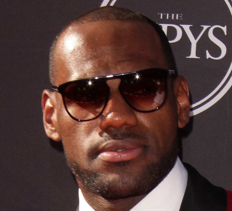 LeBron James closeup in a red suit and shades