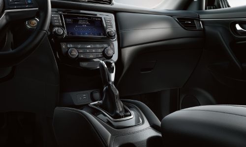2020 Nissan Rogue close up shot of shifter and lower dashboard
