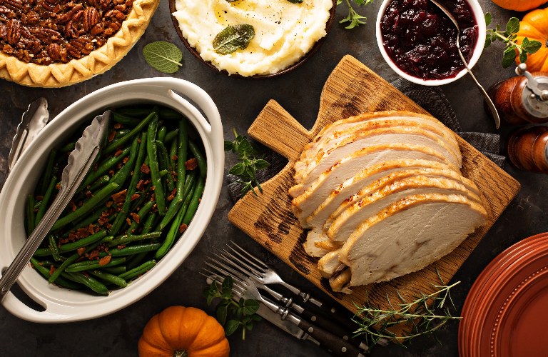 Various Thanksgiving Day foods on a table