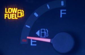 fuel meter on E, low fuel light on