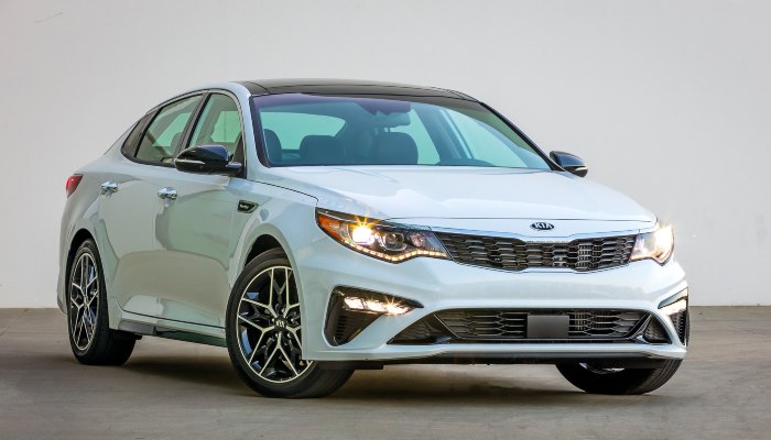 2020 Kia Optima parked in front of a blank background