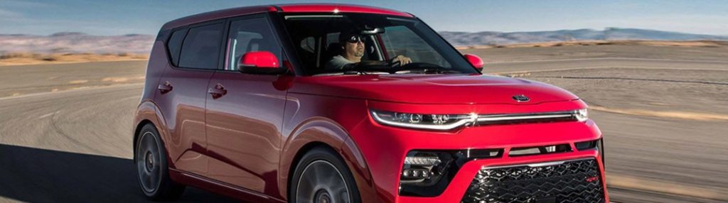 2020 Kia Soul driving down a highway road red exterior Dayton OH