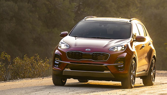 2020 Kia Sportage driving down a dirt road red exterior Dayton OH