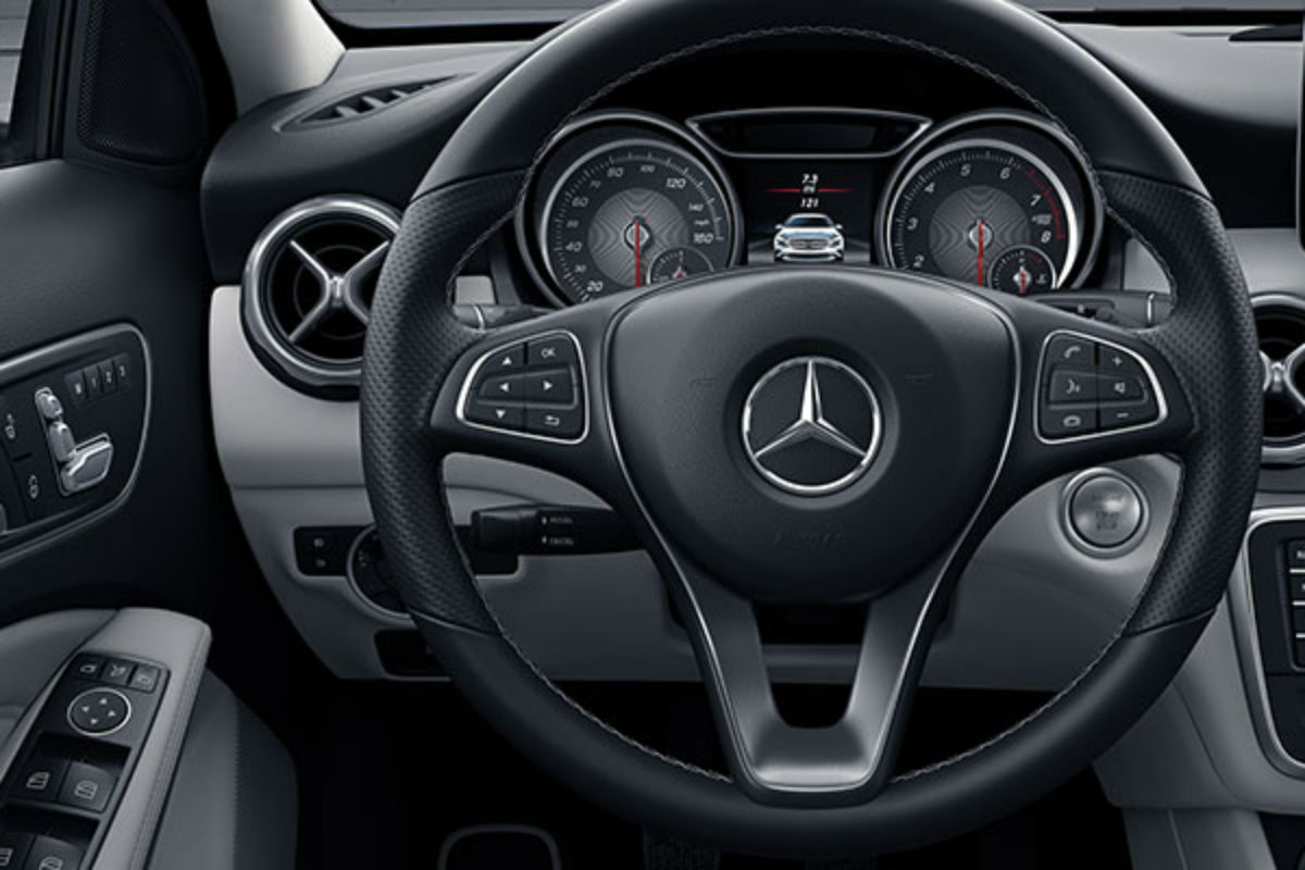 Steering wheel mounted controls and driver information center of the 2018 Mercedes-Benz GLA SUV