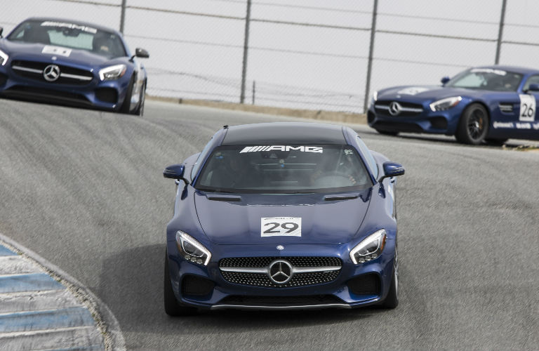 AMG Driving Academy models in a race