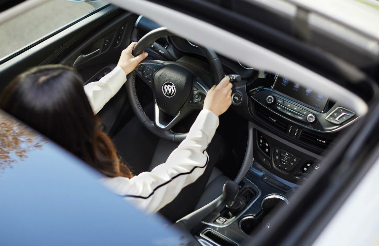 Bird's eye view of woman driving 2019 Buick Envision