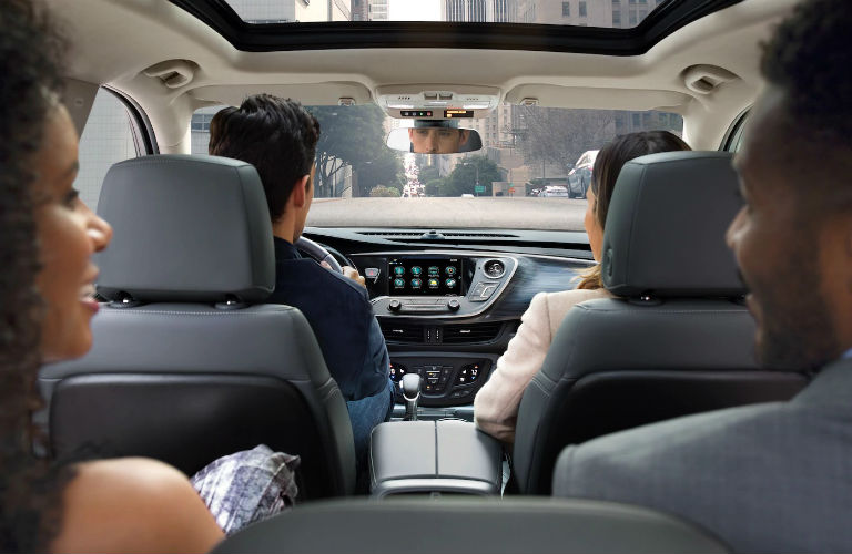 people sitting in 2019 Buick Envision