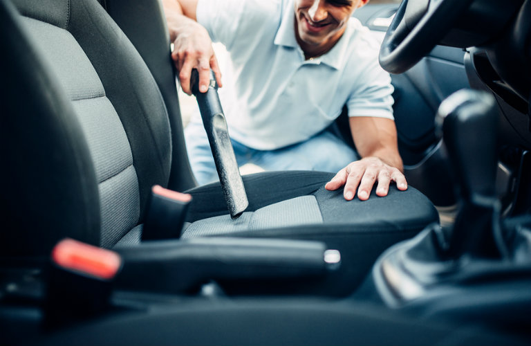 Cleaning Car Interior with Vacuum