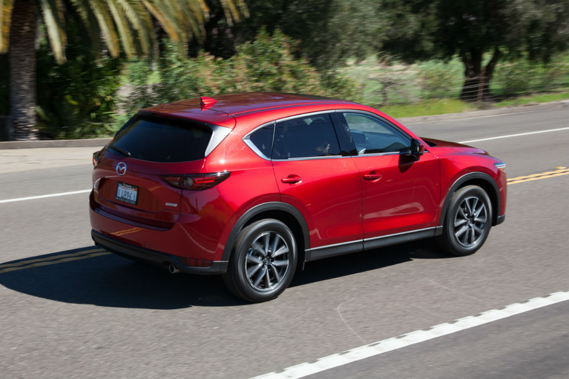 Rear exterior view of a red 2018 Mazda CX-5