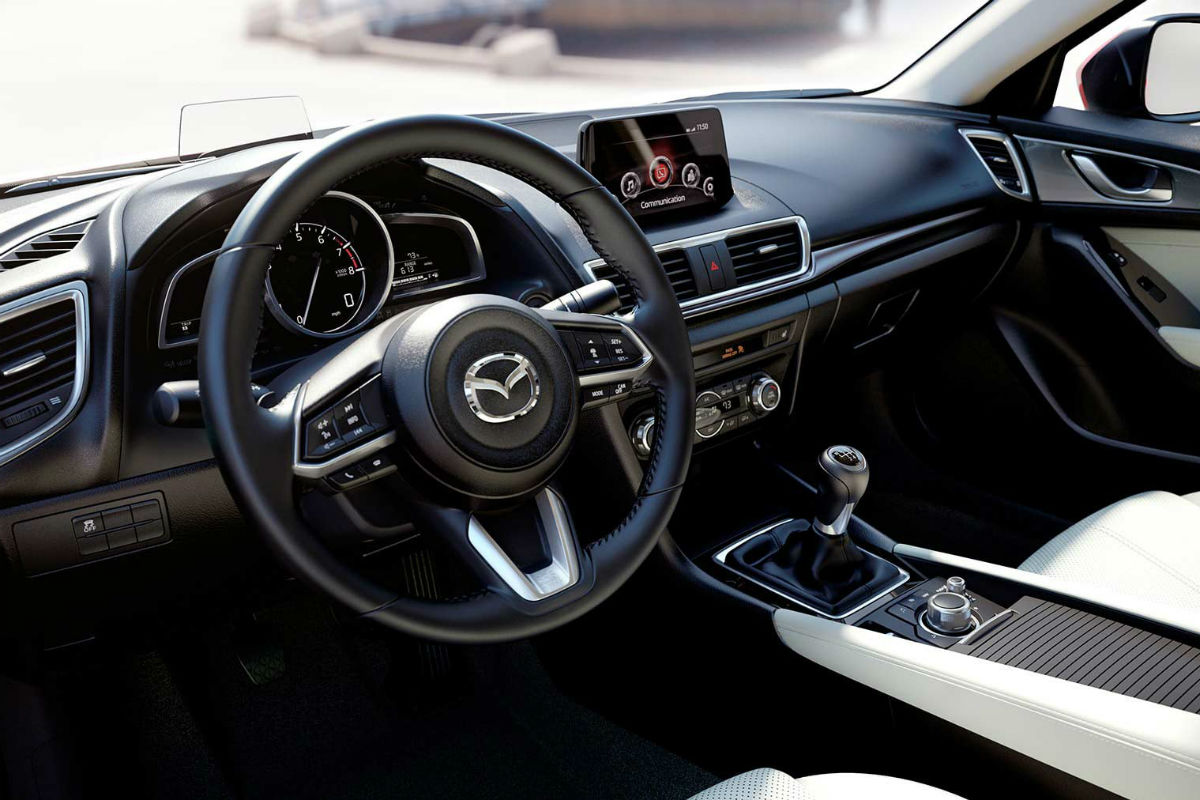 Driver's cockpit of the 2018 Mazda3