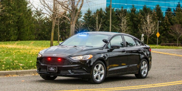 2018 Ford Plug-In Hybrid Police Vehicle Driving with Lights on